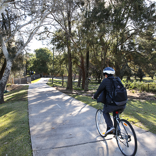 Mackey Park cyclist on bike path